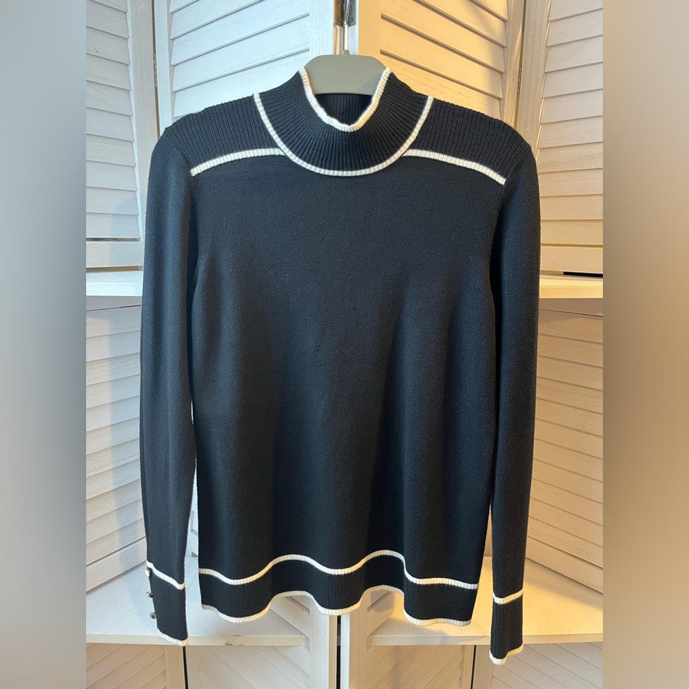 NEW RETRELOGY SWEATER